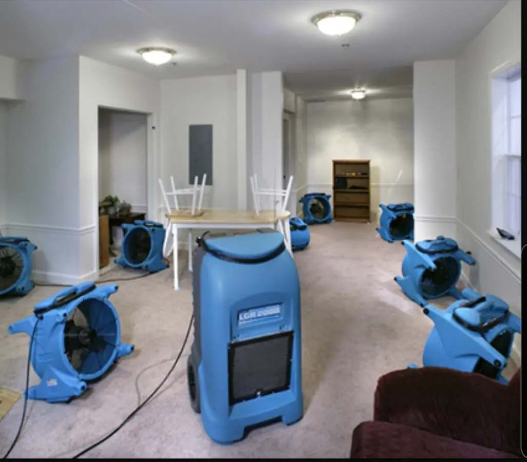 Air movers and dehumidifier setup for Water Damage Restoration in Berlin